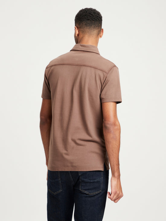 Men's regular polo shirt with tonal label emblem in brown.