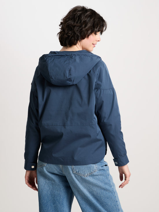 Women's regular jacket with hood, zip and snap fasteners in navy blue.